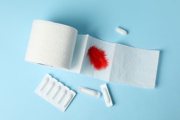 Enlarged hemorrhoids can cause symptoms such as bleeding, itching, and burning around the anus.
